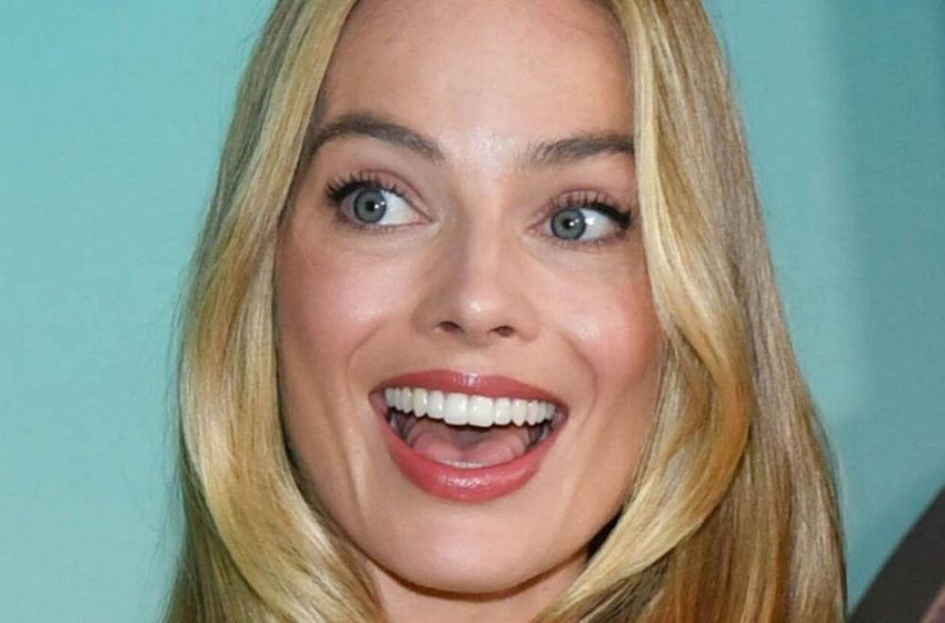  Margot Robbie Appeared in a Pink Mini-Dress With Ribbons on Her Chest With her On-Screen Lover in Beverly Hills